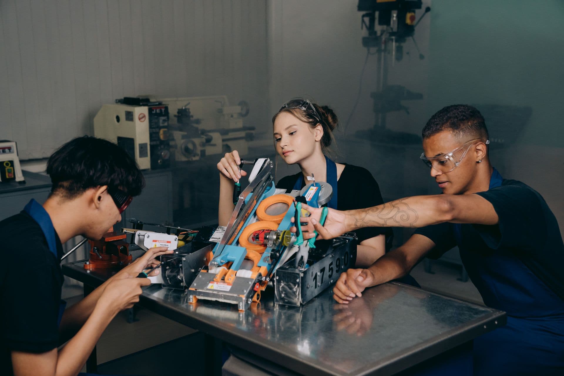 Students assembling a robotics project